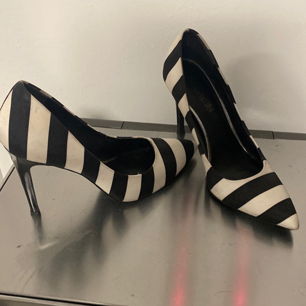 Black and white striped heel made by cosmopolitan